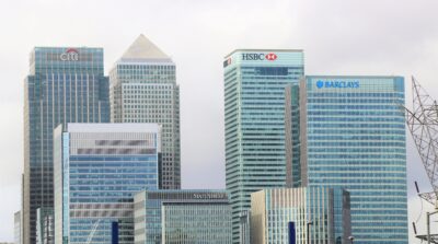 Office towers in London's Canary Wharf, with the Barclays headquarters tower and its logo on the right beside HSBC and Citi
