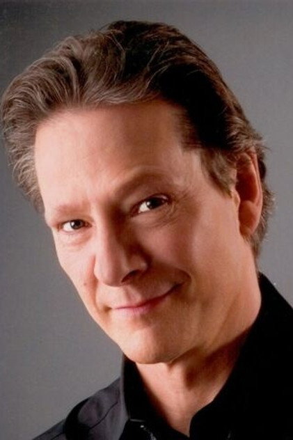 Chris Cooper como Jack Maclaine