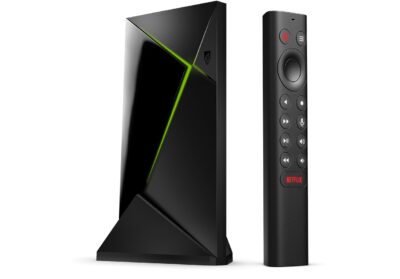 Nvidia Shield TV Pro streaming box with its remote — NVIDIA