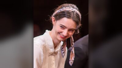 Tanya Reynolds smiling at the curtain call of She Stoops to Conquer at the Orange Tree Theatre, Richmond, December 2023