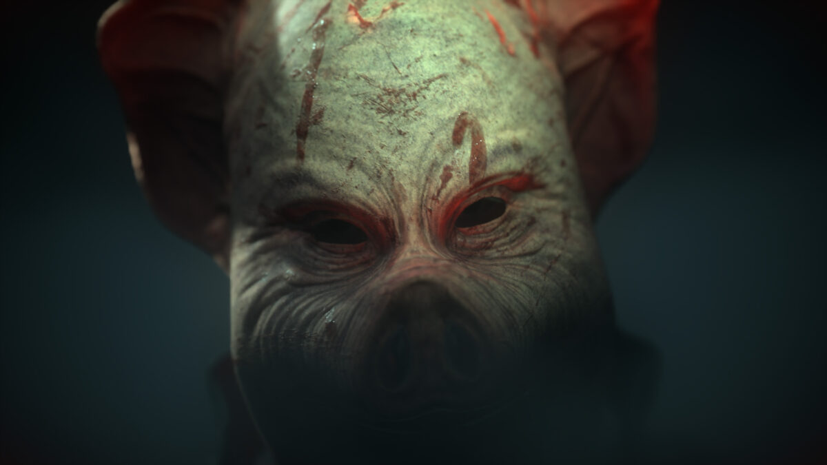 Close-up of a blood-streaked pig mask worn by a stalker in The Pines