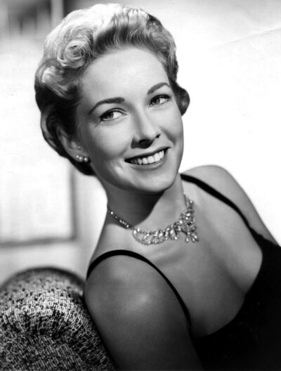 Vera Miles smiling in a 1959 black-and-white CBS publicity portrait for General Electric Theater