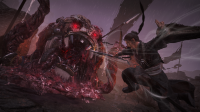 Wo Long 2: Wings of Ember screenshot: a warrior leaps at a giant red-eyed demon in the rain