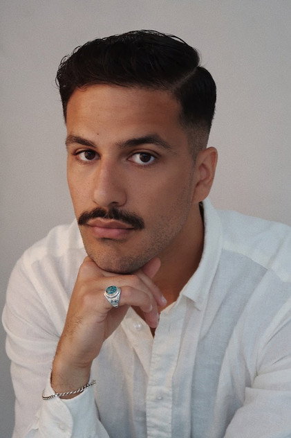 Mustafa Al-Mashhadani como Amir