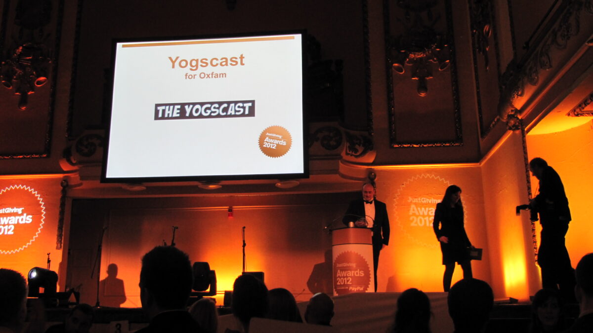 Stage screen reading Yogscast for Oxfam at the JustGiving Awards 2012