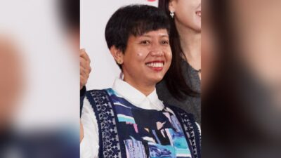 Indonesian film producer Yulia Evina Bhara smiling at the jury press conference of the 30th Busan International Film Festival, 2025