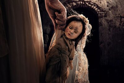 The Communion Girl: A Cursed Doll Elevates a Familiar Horror Tale