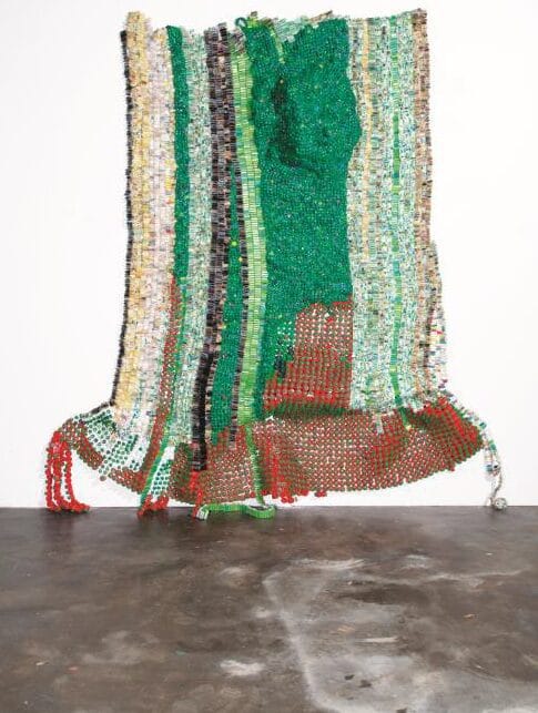 Moffat Takadiwa (Zimbabwe), Washen Again (2019). Toothbrushes and dishwashing liquid bottle tops, 260 x 240 x 25 cm. Copyright of the artist, courtesy of Tyburn Gallery