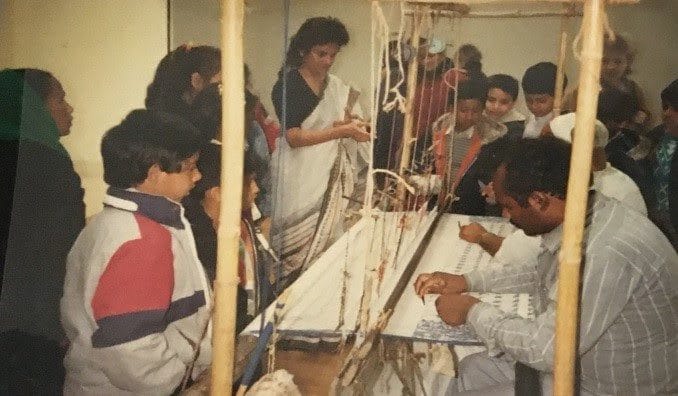 Children taking part in weaving workshops during the exhibition, Woven Air: The Muslim and Kantha Tradition of Bangladesh, 4 March –1 May 1988, Whitechapel Gallery. Whitechapel Gallery Archive.