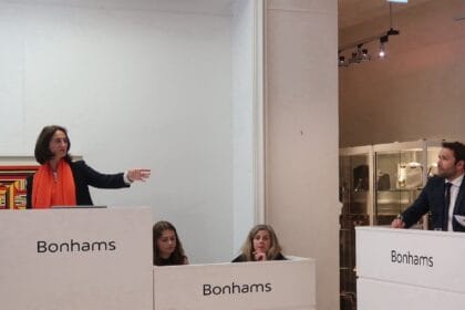 Catherine Yaiche, Managing Director, Bonhams France on the rostrum at the Paris Fine Watches Sale