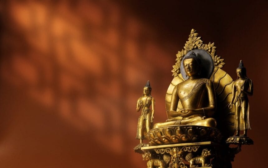 A Gilt Copper Alloy Triad of Shakyamuni Buddha Qing Dynasty, 18th Century Sold for HK$8,067,000