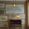 From top to bottom: Frank Lloyd Wright’s Ceiling Light from the Francis W. Little House; Architectural renderings by Frank Lloyd Wright; Greene & Greene Fall Front Desk and Chair from the Charles Millard Pratt House