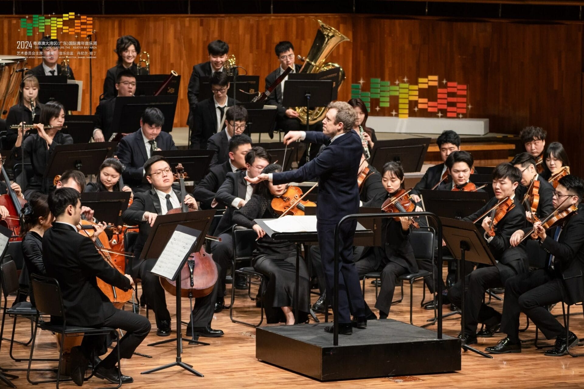 Music Director Daniel Harding conducts the YMCG Symphony Orchestra scaled