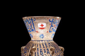 A Mamluk enamelled glass mosque lamp made for Chief of Corps Saif ad-din Sarghitmish (d.1358) Egypt or Syria, 1351-1358 AD. Sold for £5,130,400 (estimate: £600,000-1,000,000)