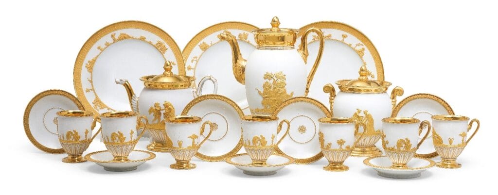 A selection from a very rare and extensive Meissen service, early 19th century, decorated in high relief picked out in gilding with various scenes after Antiquity. Estimate: £30,000-50,000.