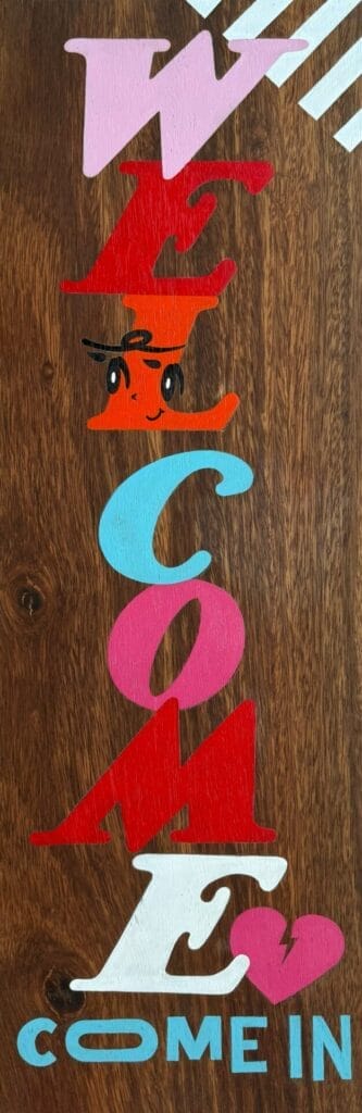Peep WELCOME. 2025. Acrylic on wood_H60 by W20 by D2.5 cm. Courtesy of the artist and JPS Gallery 
